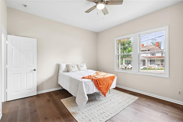 1316 E S 6th St, Seneca, SC 29678 - bedroom featuring baseboards, wood finished floors, and ceiling fan