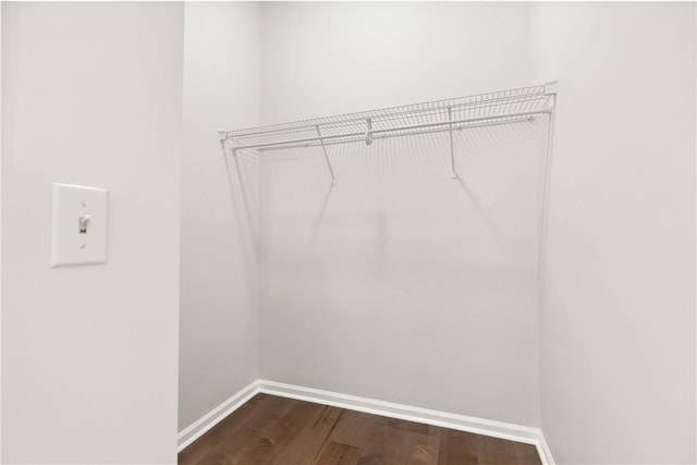 1316 E S 6th St, Seneca, SC 29678 - laundry room with baseboards and dark wood-type flooring