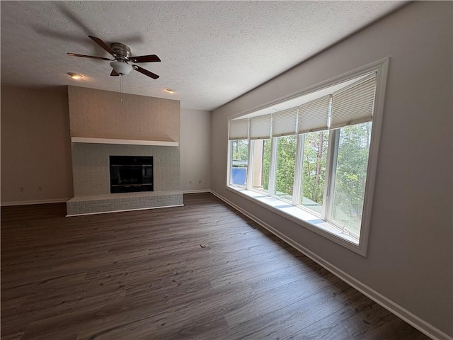 495 Tall Ship Dr Unit 340, Salem, SC 29676 - unfurnished living room with baseboards, a textured ceiling, dark wood-style flooring, and a ceiling fan