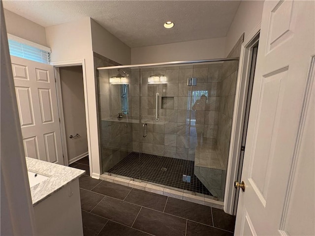 495 Tall Ship Dr Unit 340, Salem, SC 29676 - full bathroom featuring a textured ceiling, vanity, a shower stall, tile patterned floors, and recessed lighting