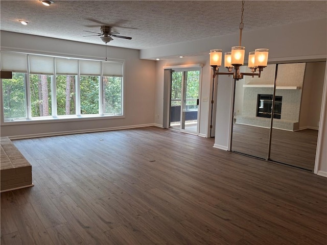 495 Tall Ship Dr Unit 340, Salem, SC 29676 - unfurnished living room with a ceiling fan, a chandelier, dark wood-style floors, a textured ceiling, and baseboards