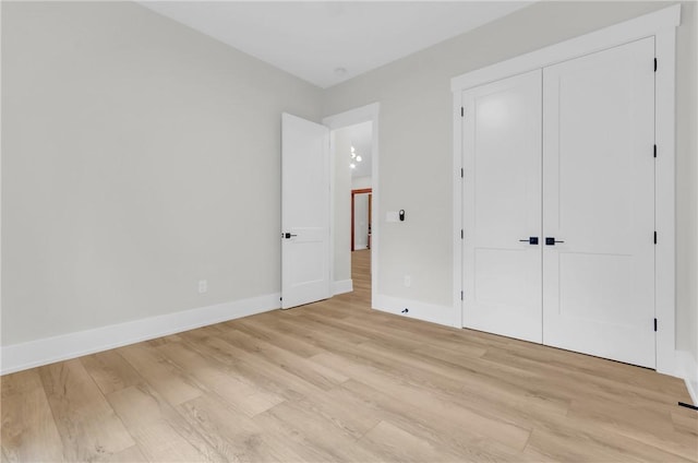 120 Thomason View Rd, Fountain Inn, SC 29644 - unfurnished bedroom featuring light wood-type flooring, baseboards, and a closet