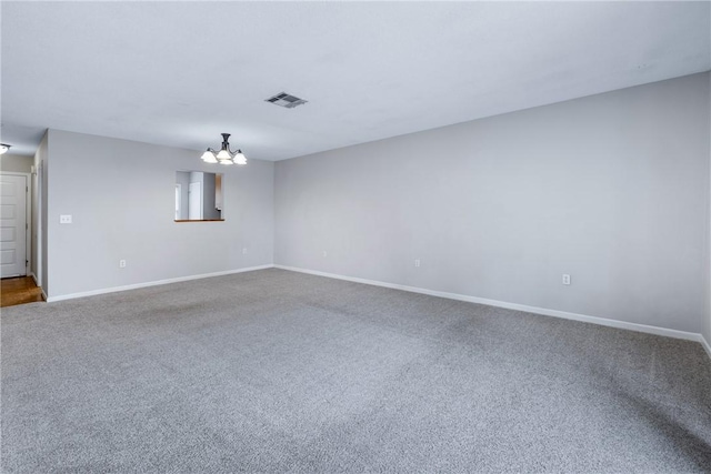 13036 W Camelia Ln, Seneca, SC 29678 - unfurnished room featuring carpet floors, a chandelier, and baseboards