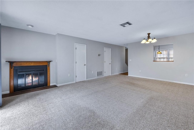 13036 W Camelia Ln, Seneca, SC 29678 - unfurnished living room featuring a glass covered fireplace, baseboards, a chandelier, and carpet floors