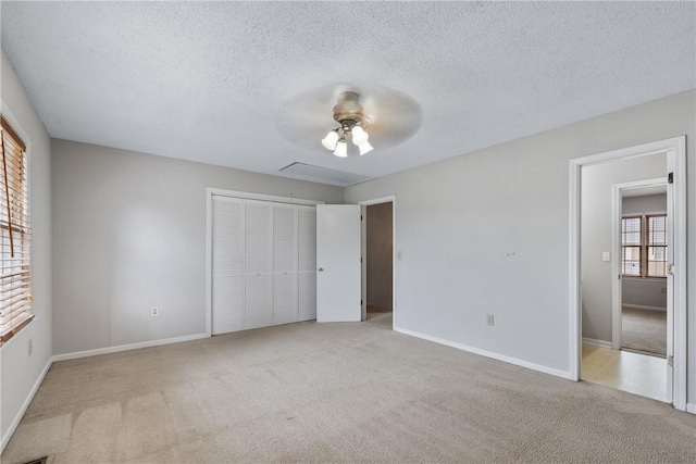 13036 W Camelia Ln, Seneca, SC 29678 - unfurnished bedroom with attic access, carpet flooring, a textured ceiling, baseboards, and a closet