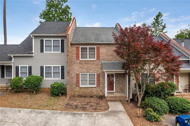 13036 W Camelia Ln, Seneca, SC 29678 - view of front of home featuring a shingled roof and brick siding
