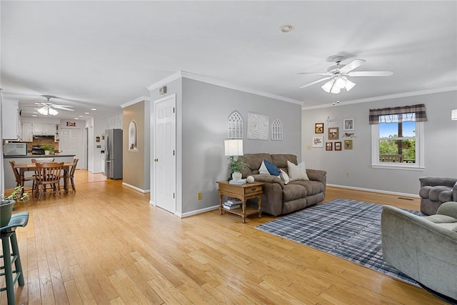 101 Long View Ln, Pickens, SC 29671 - living room with a ceiling fan, light wood-style floors, baseboards, and ornamental molding
