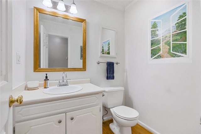 101 Long View Ln, Pickens, SC 29671 - bathroom featuring vanity, toilet, crown molding, wood finished floors, and baseboards