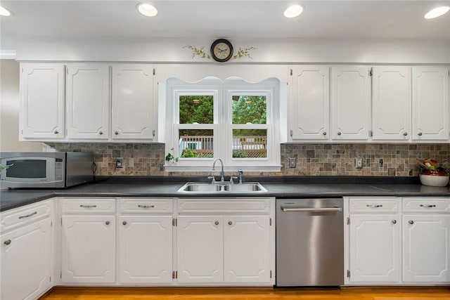 101 Long View Ln, Pickens, SC 29671 - kitchen with appliances with stainless steel finishes, a sink, dark countertops, and recessed lighting