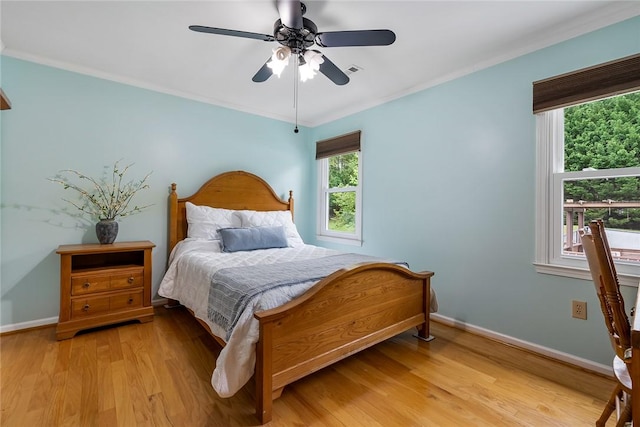 101 Long View Ln, Pickens, SC 29671 - bedroom with crown molding, light wood-style floors, baseboards, and ceiling fan