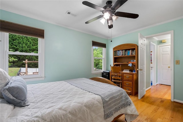 101 Long View Ln, Pickens, SC 29671 - bedroom with light wood finished floors, crown molding, baseboards, and a ceiling fan