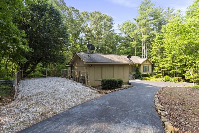 199 Mountain Rest Lake Rd, Mountain Rest, SC 29664 - view of side of home with asphalt driveway and board and batten siding