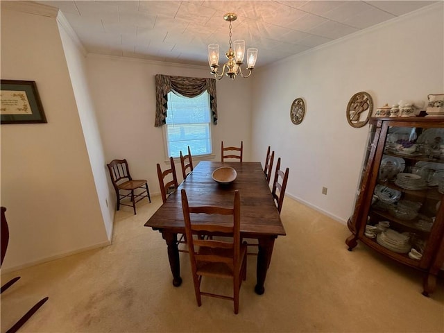 308 Oak Drive Ext, Honea Path, SC 29654 - dining area featuring ornamental molding, light colored carpet, a chandelier, and baseboards