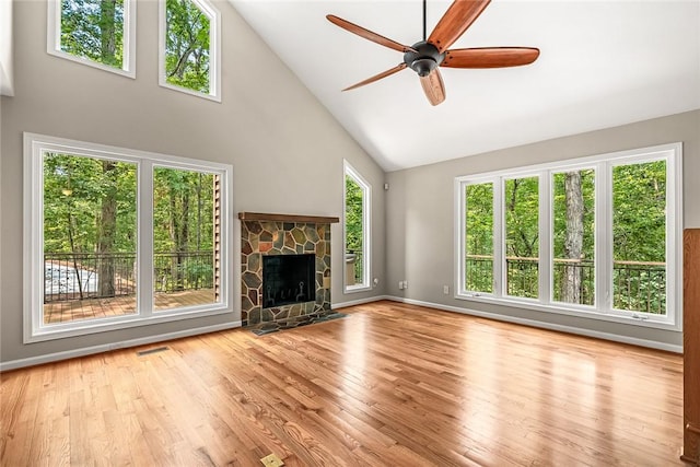 307 Warbranch Rd, Central, SC 29630 - unfurnished living room featuring high vaulted ceiling, a ceiling fan, a fireplace, wood finished floors, and baseboards