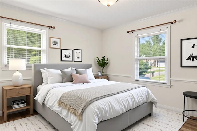 205 Fernwood Dr, Seneca, SC 29678 - bedroom with wood finished floors, ornamental molding, and baseboards