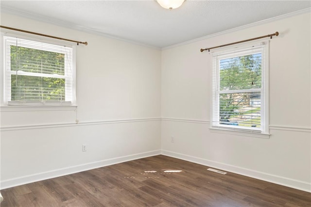 205 Fernwood Dr, Seneca, SC 29678 - unfurnished room with healthy amount of natural light, crown molding, wood finished floors, and baseboards
