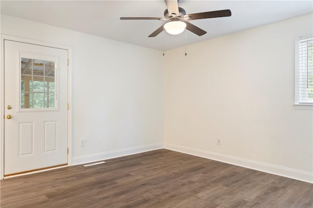 205 Fernwood Dr, Seneca, SC 29678 - unfurnished room featuring dark wood finished floors, baseboards, and ceiling fan