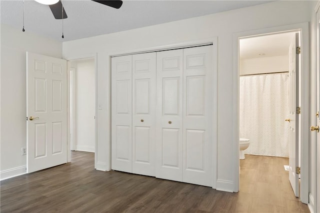 205 Fernwood Dr, Seneca, SC 29678 - unfurnished bedroom with wood finished floors, a closet, baseboards, and a ceiling fan