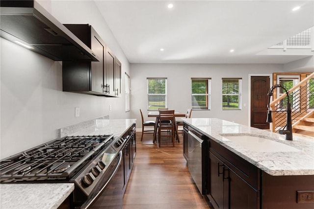2000 Ridge Rd, Hartwell, GA 30643 - kitchen with gas range, a sink, dishwasher, wood finished floors, and recessed lighting