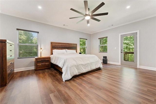 2000 Ridge Rd, Hartwell, GA 30643 - bedroom featuring multiple windows, dark wood-type flooring, baseboards, crown molding, and recessed lighting