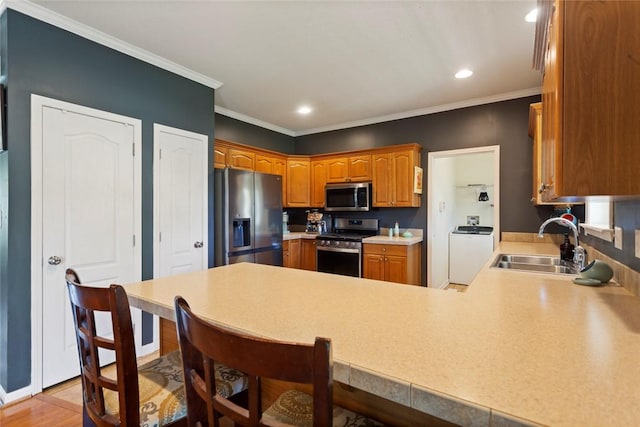 661 Playground Rd, Walhalla, SC 29691 - kitchen with stainless steel appliances, a peninsula, a sink, recessed lighting, and light countertops