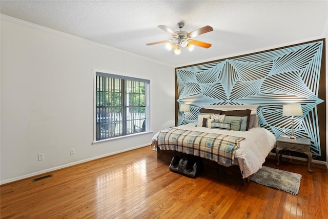 661 Playground Rd, Walhalla, SC 29691 - bedroom featuring wood-type flooring, baseboards, ornamental molding, and ceiling fan
