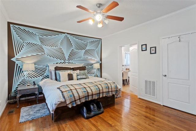 661 Playground Rd, Walhalla, SC 29691 - bedroom with wood finished floors, crown molding, baseboards, and ceiling fan