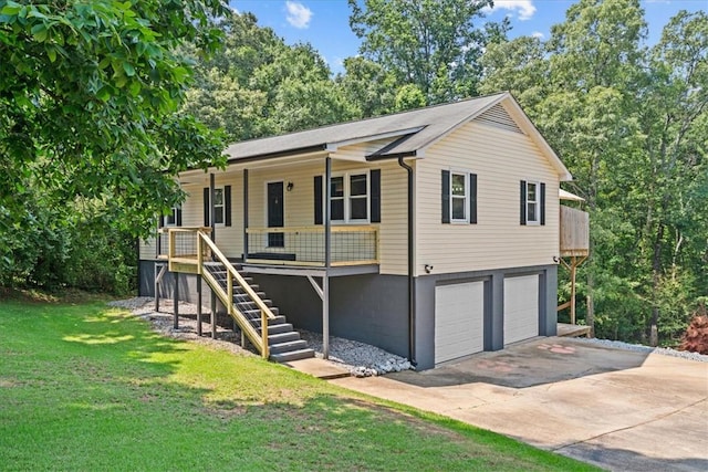 205 Partridge Ct, Anderson, SC 29625 - view of front of house featuring covered porch, a front lawn, an attached garage, concrete driveway, and stairway