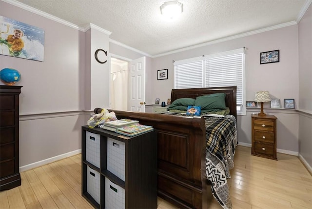 151 Hannah Cir, Anderson, SC 29621 - bedroom with light wood-style floors, ornamental molding, a textured ceiling, and baseboards
