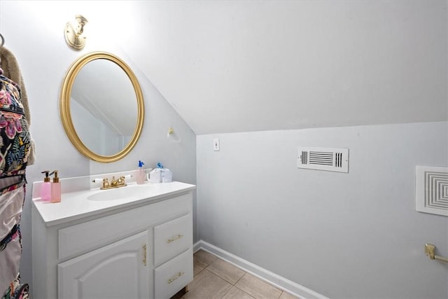 151 Hannah Cir, Anderson, SC 29621 - bathroom with vanity, lofted ceiling, tile patterned floors, and baseboards