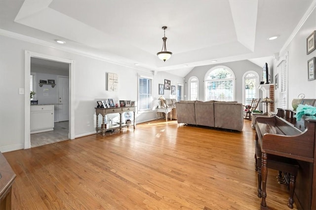 151 Hannah Cir, Anderson, SC 29621 - living room with a raised ceiling, light wood-type flooring, recessed lighting, a fireplace, and ornamental molding