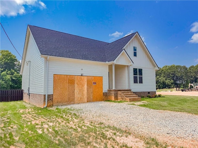 206 Highland Ave, Westminster, SC 29693 - view of front of house featuring board and batten siding, roof with shingles, and crawl space