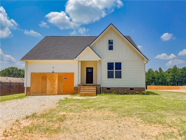 206 Highland Ave, Westminster, SC 29693 - view of front of home featuring board and batten siding, crawl space, driveway, and a shingled roof