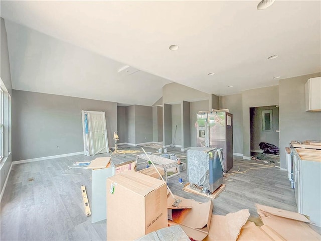 206 Highland Ave, Westminster, SC 29693 - living room with light wood-style flooring, baseboards, and lofted ceiling