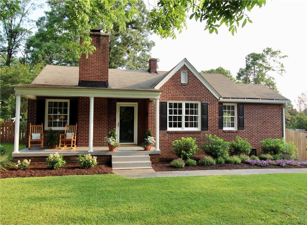 408 Pine Hill Ct, Anderson, SC 29625 - ranch-style home with brick siding, covered porch, and a chimney