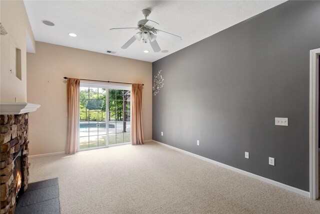 204 Lakeside Dr, Walhalla, SC 29691 - unfurnished living room with a ceiling fan, carpet floors, baseboards, a fireplace, and recessed lighting