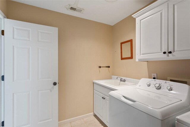 204 Lakeside Dr, Walhalla, SC 29691 - laundry room featuring cabinet space, independent washer and dryer, and baseboards