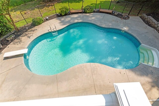 204 Lakeside Dr, Walhalla, SC 29691 - view of pool with a patio area, a fenced backyard, and a diving board