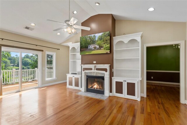 204 Lakeside Dr, Walhalla, SC 29691 - unfurnished living room featuring lofted ceiling, a ceiling fan, a high end fireplace, wood finished floors, and recessed lighting