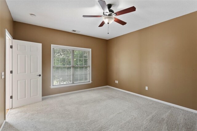 204 Lakeside Dr, Walhalla, SC 29691 - empty room featuring carpet flooring, baseboards, a ceiling fan, and a smoke detector