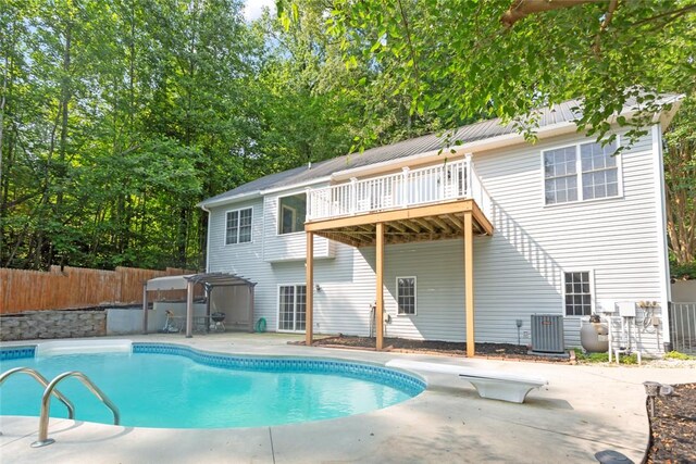 204 Lakeside Dr, Walhalla, SC 29691 - back of property featuring a patio, central AC unit, and metal roof