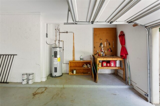 204 Lakeside Dr, Walhalla, SC 29691 - garage with water heater and a workshop area