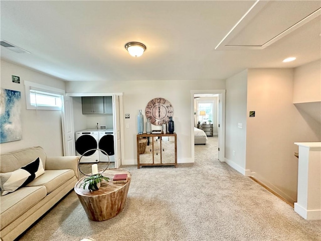 448 Seaborn Cir, Pendleton, SC 29670 - living area featuring independent washer and dryer, attic access, light carpet, and healthy amount of natural light