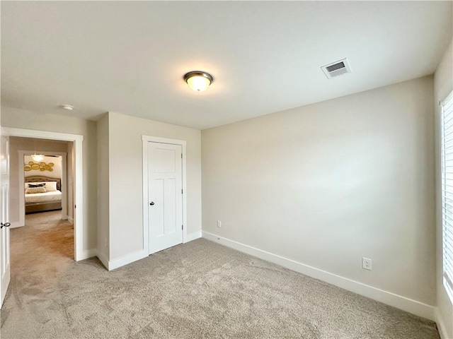 448 Seaborn Cir, Pendleton, SC 29670 - unfurnished bedroom featuring light carpet, baseboards, and a closet