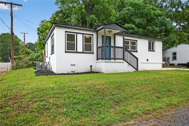1103 Scott Dr, Anderson, SC 29625 - view of front facade with a front yard and stucco siding