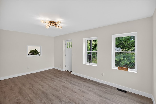 1103 Scott Dr, Anderson, SC 29625 - spare room featuring plenty of natural light and wood finished floors