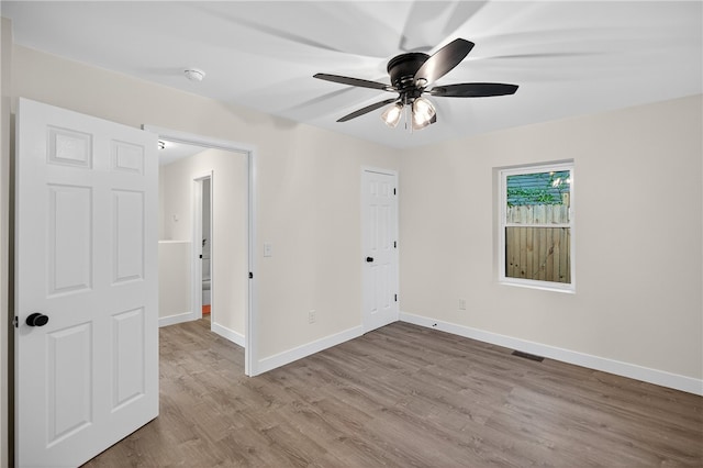 1103 Scott Dr, Anderson, SC 29625 - spare room featuring wood finished floors, ceiling fan, and a smoke detector