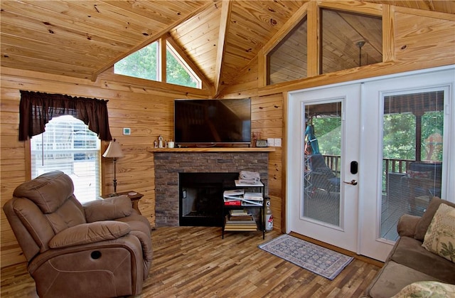 669 N Fleetwood Ln, Fair Play, SC 29643 - living area featuring french doors, wooden ceiling, wood walls, vaulted ceiling, and plenty of natural light