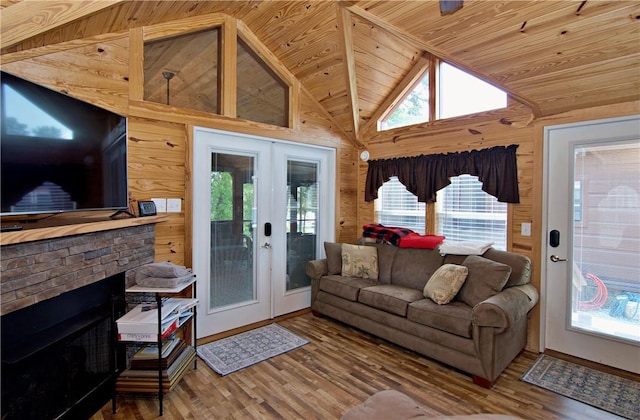 669 N Fleetwood Ln, Fair Play, SC 29643 - living area featuring french doors, wooden walls, wooden ceiling, wood finished floors, and a fireplace