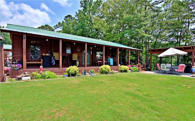 669 N Fleetwood Ln, Fair Play, SC 29643 - back of house featuring a yard, a porch, and metal roof
